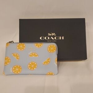 Coach orange slice wristlet